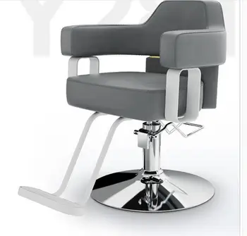 Парикмахерское кресло в парикмахерской Парикмахерское кресло в парикмахерском салоне можно поднимать и опускать. Мебель для салона, sal